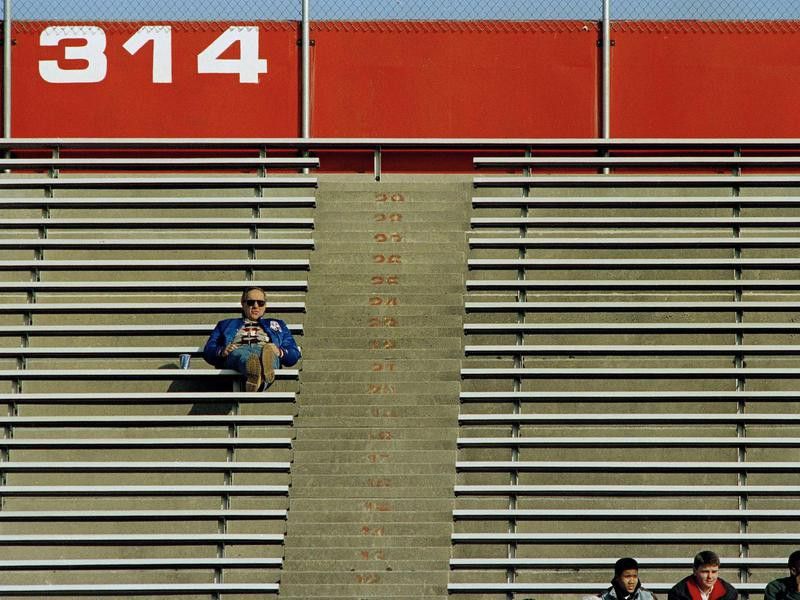 A lonely fan in stands