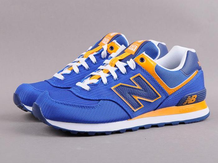 A pair of New Balance 574 shoes