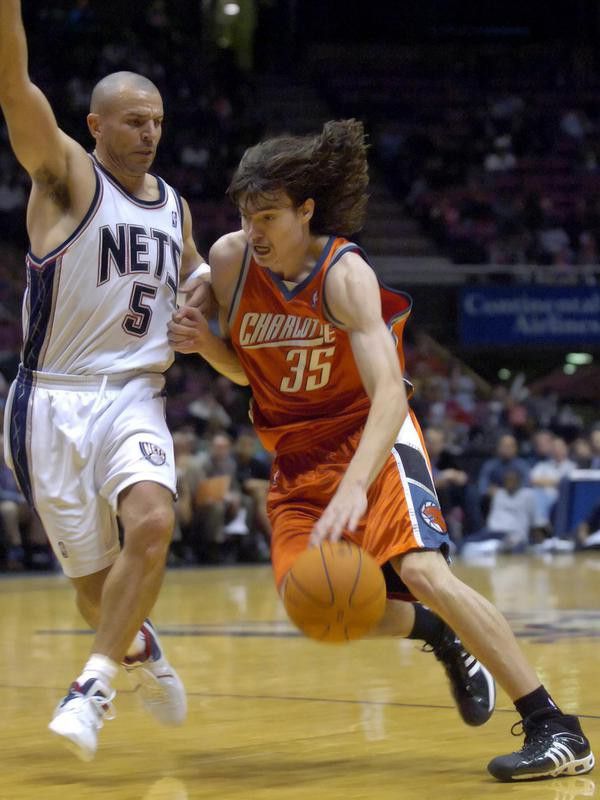 Adam Morrison drives to the basket