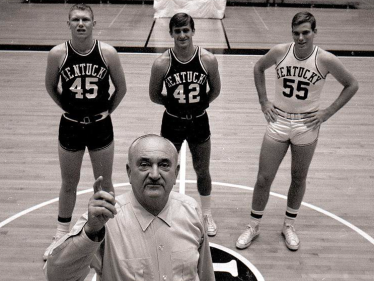 Adolph Rupp with his players