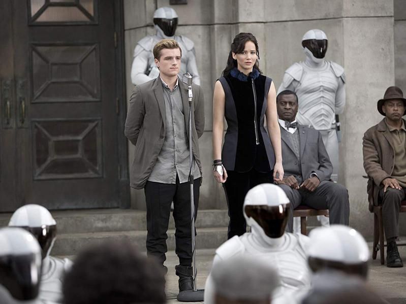 Afemo Omilami, Josh Hutcherson, and Jennifer Lawrence in The Hunger Games: Catching Fire (2013)