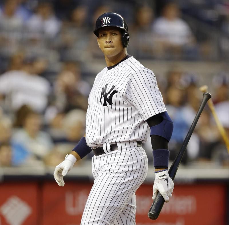 Alex Rodriguez reacts after striking out