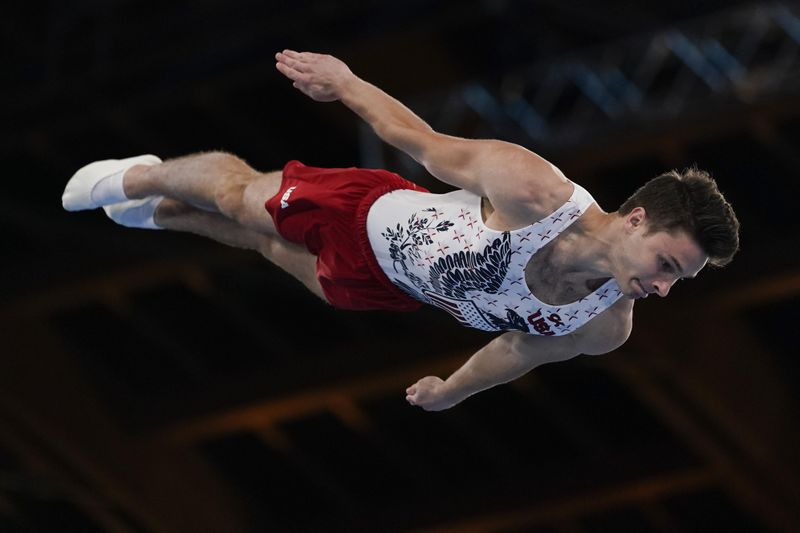 Aliaksei Shostak competes in men's trampoline gymnastics