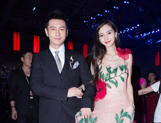Angela Yeung and Huang Xiaoming smiling