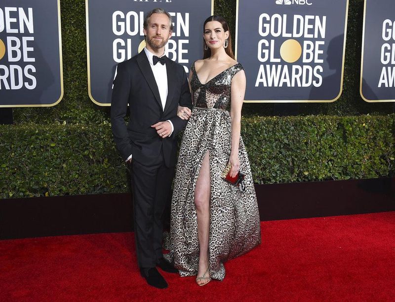 Anne Hathaway and Adam Shulman at the Golden Globes
