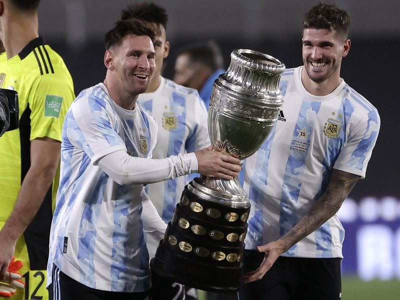 Argentina's Lionel Messi holds Copa America trophy