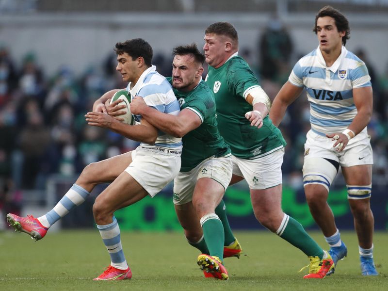 Argentina's Santiago Carreras is tickled by Ireland's Ronan Kelleher