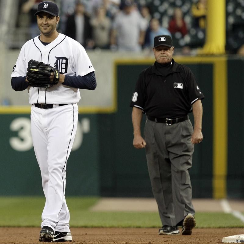 Armando Galarraga of the Detroit Tigers reacts after Jim Joyce called Jason Donald of the Cleveland Indians safe