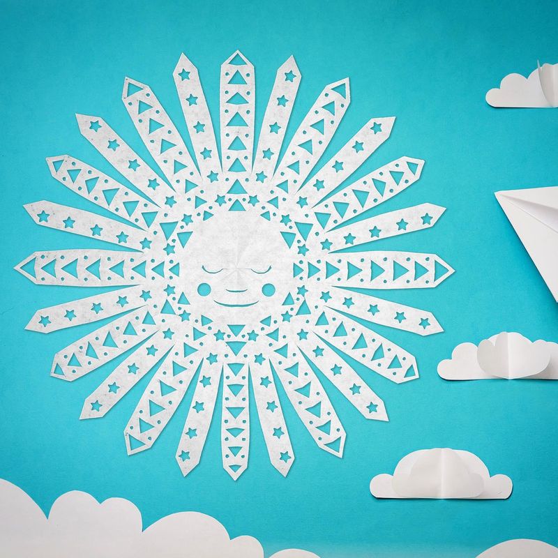 Artistic sun paper snowflake design