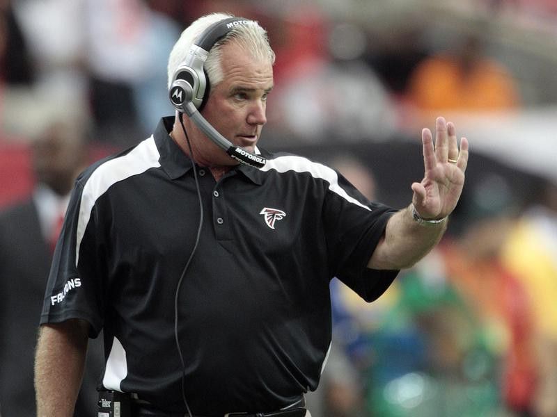 Atlanta Falcons coach Mike Smith patrols sidelines