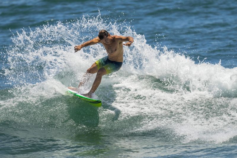 Australia's Julian Wilson rides wave