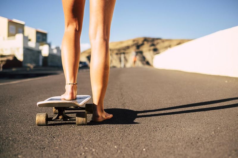 Barefoot skateboarder
