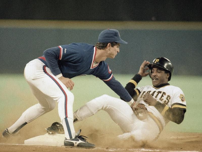 Barry Bonds slides safely under the tag of Chicago Cubs third baseman Wade Rowdon