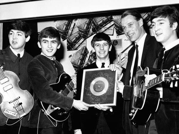 Beatles getting a gold record