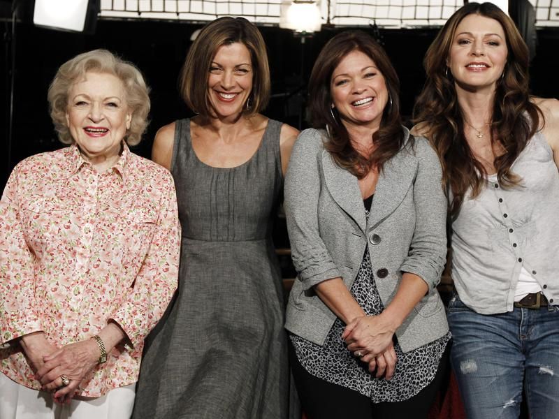 Betty White with the Hot in Cleveland cast