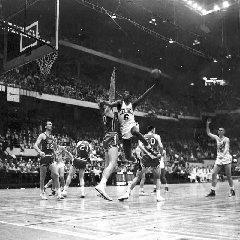 Bill Russell goes up against defense