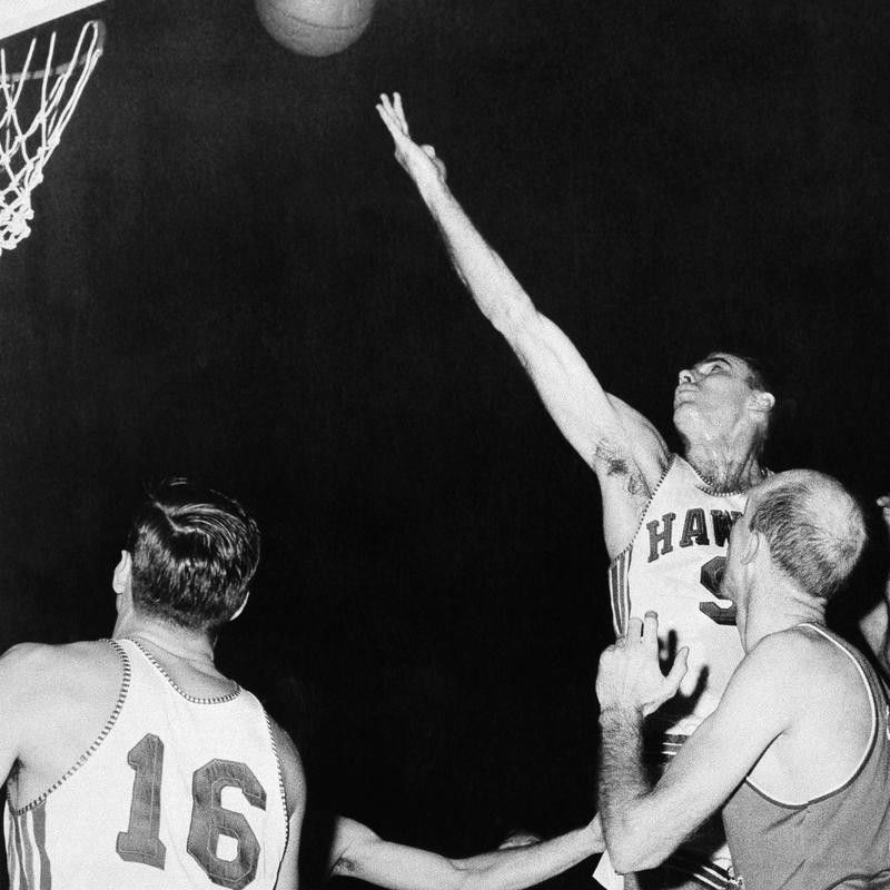 Bob Pettit lets the ball roll off his fingers for two pointer