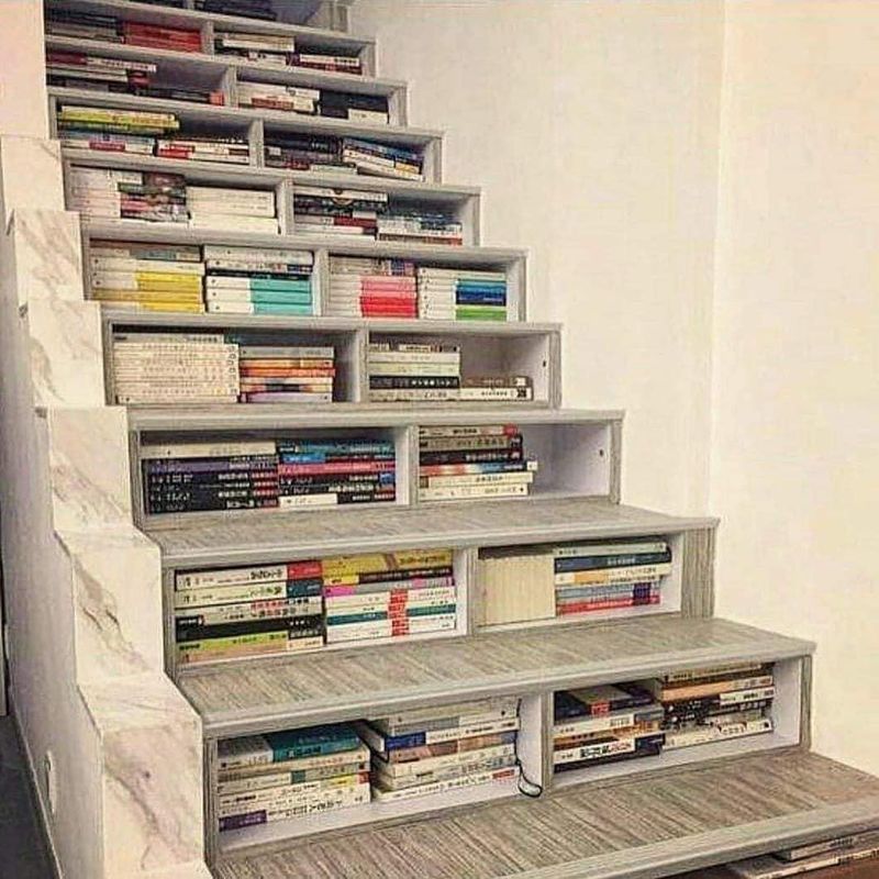 Books under stairs