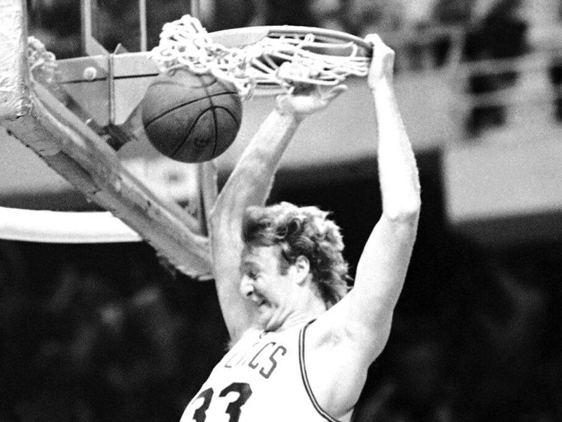 Boston Celtics forward Larry Bird dunks