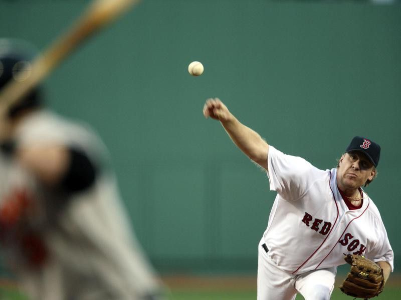 Boston Red Sox's Curt Schilling delivers pitch
