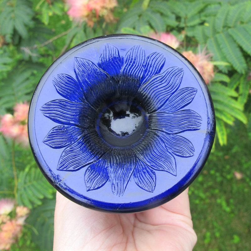 Bottom of blue corn vase