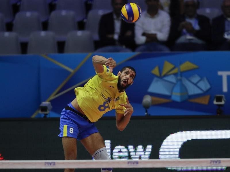 Brazil's Wallace De Souza spikes the ball