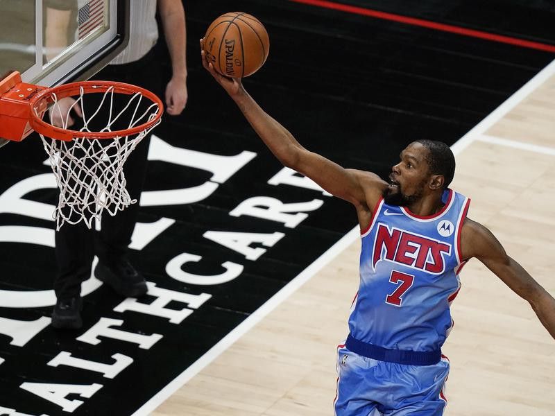 Brooklyn Nets forward Kevin Durant scores against Atlanta Hawks