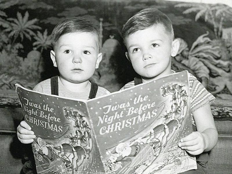 Brothers reading at Christmas