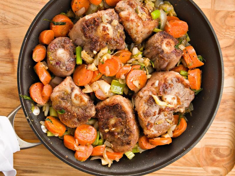 Browning oxtails and vegetables