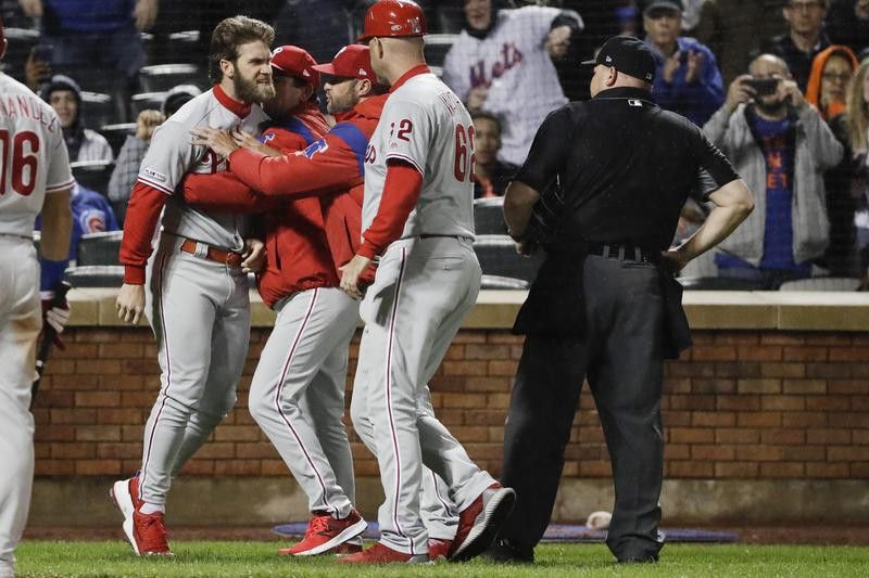 Bryce Harper argues with umpire