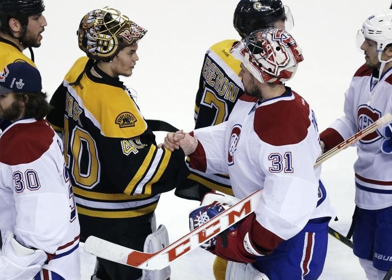Carey Price of the Montreal Canadiens congratulated by Tuukka of the Boston Bruins in the Stanley Cup