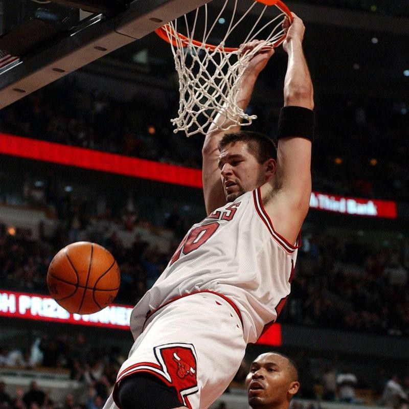 Chicago Bulls' Brad Miller dunks the ball