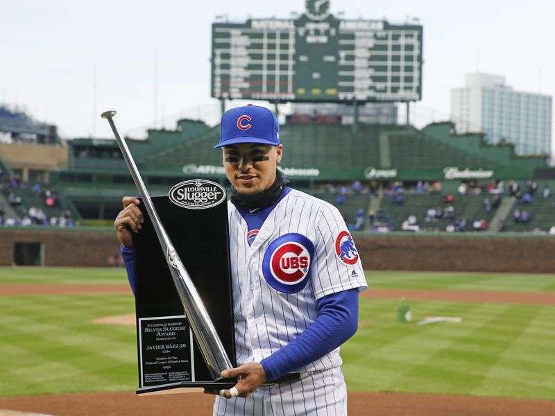 Chicago Cubs' Javier Baez holds Silver Slugger Award