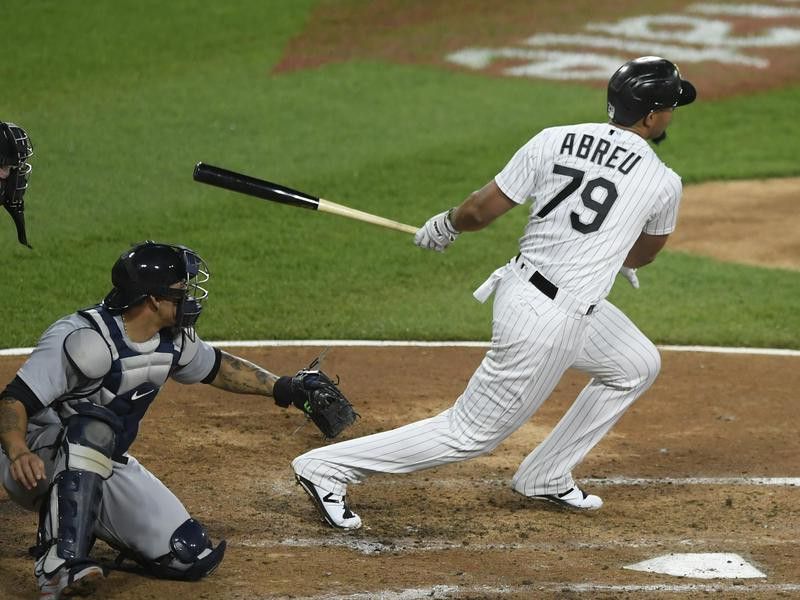 Chicago White Sox's Jose Abreu watches his two-RBI