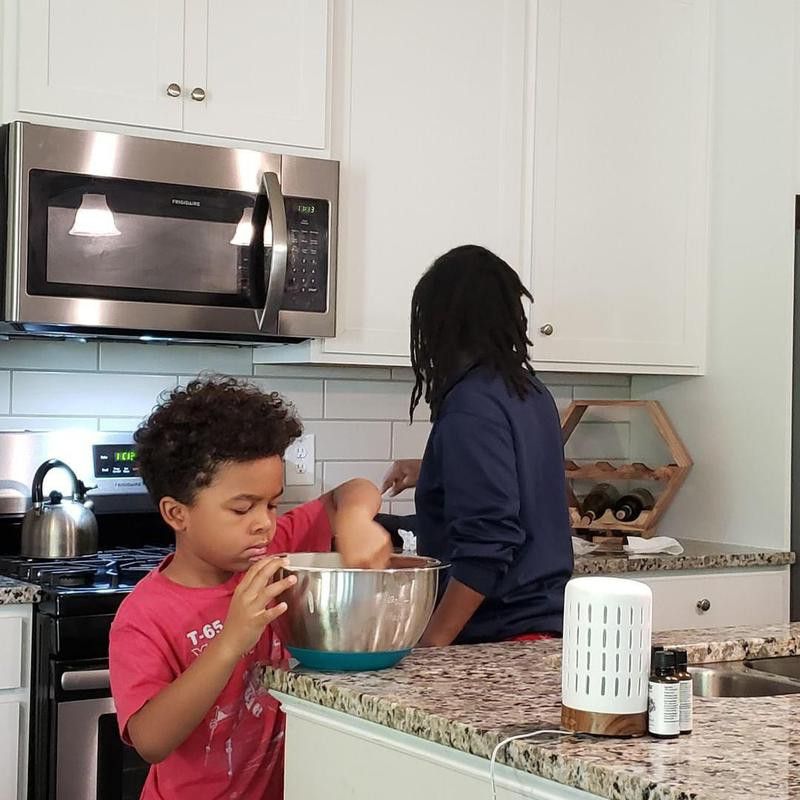 Child cooking with parent
