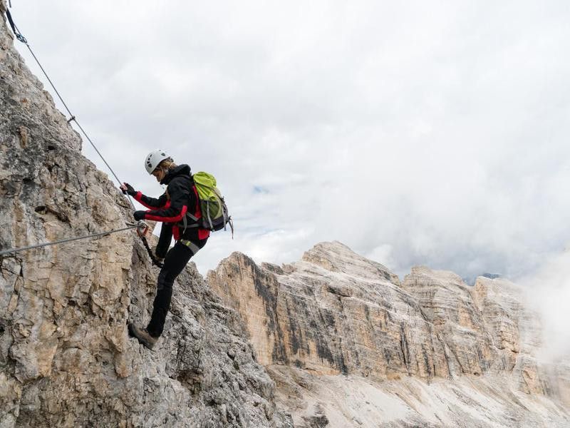 Climber on Via Ferrata, Dolomites, Italy