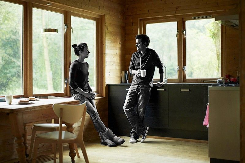 Couple talking in kitchen