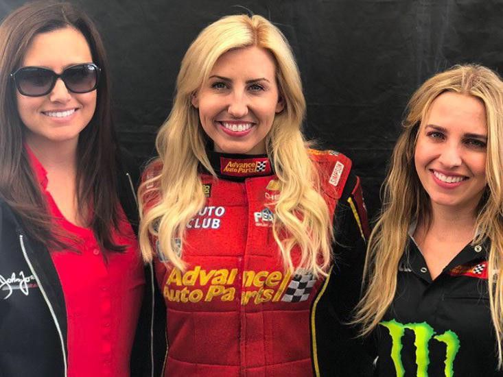 Courtney Force poses with people