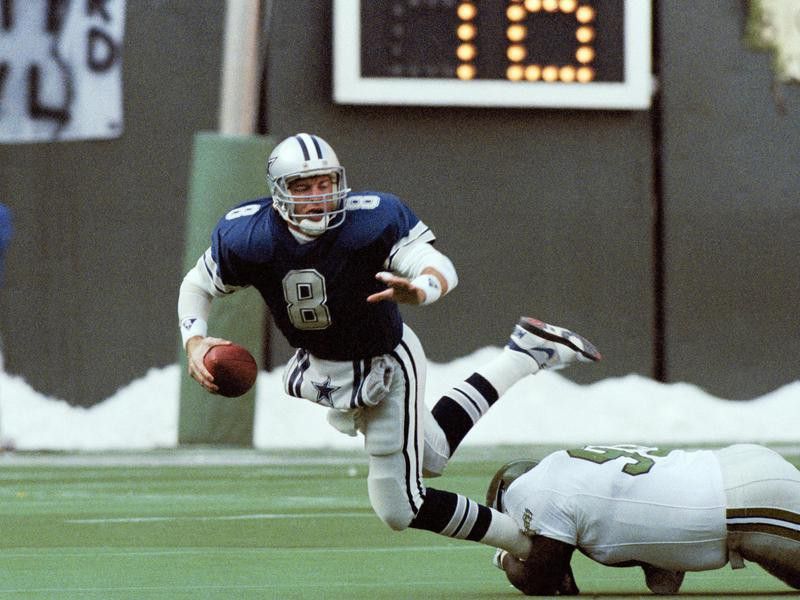 Dallas Cowboys' quarterback Troy Aikman tackled by Eagles