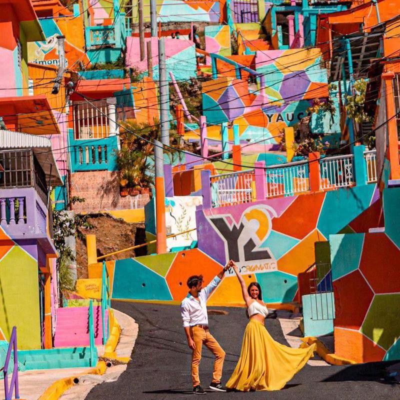 Danni and Fede dancing in colorful street