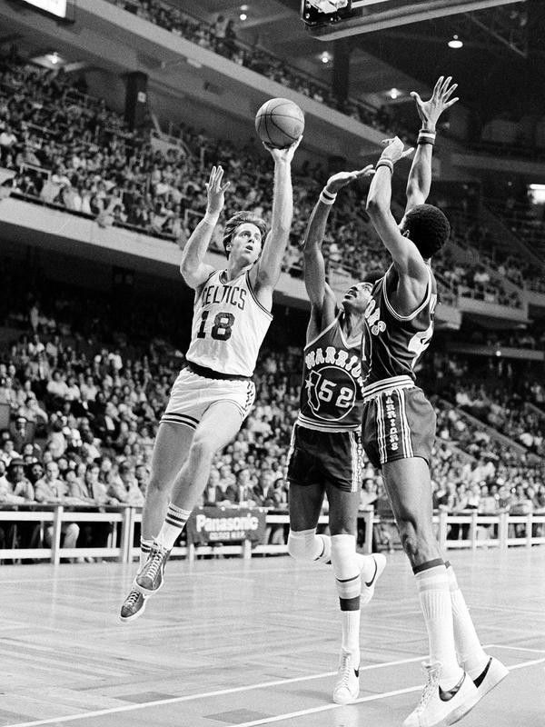Dave Cowens of the Boston Celtics goes up for a basket