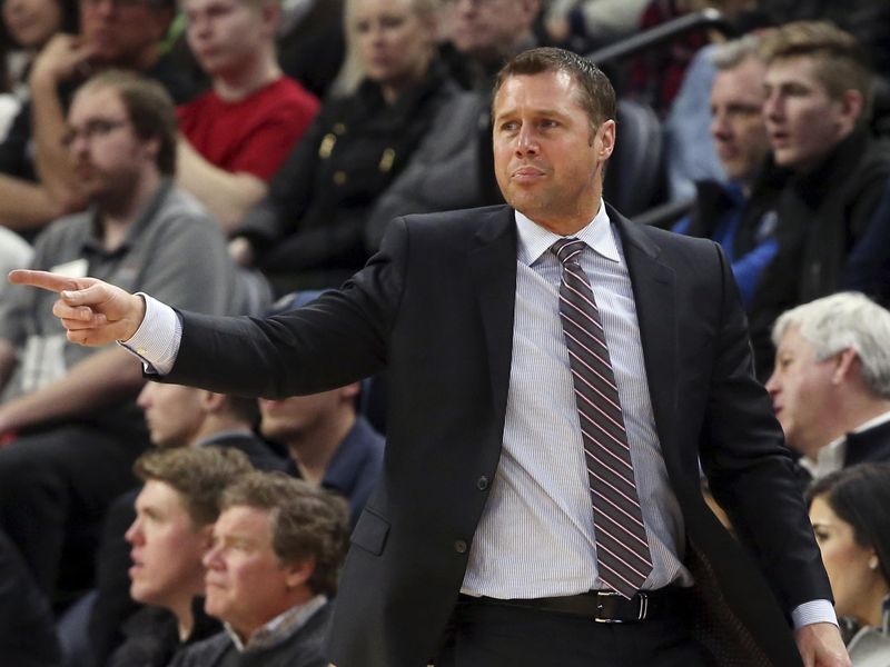 Dave Joerger directs his team