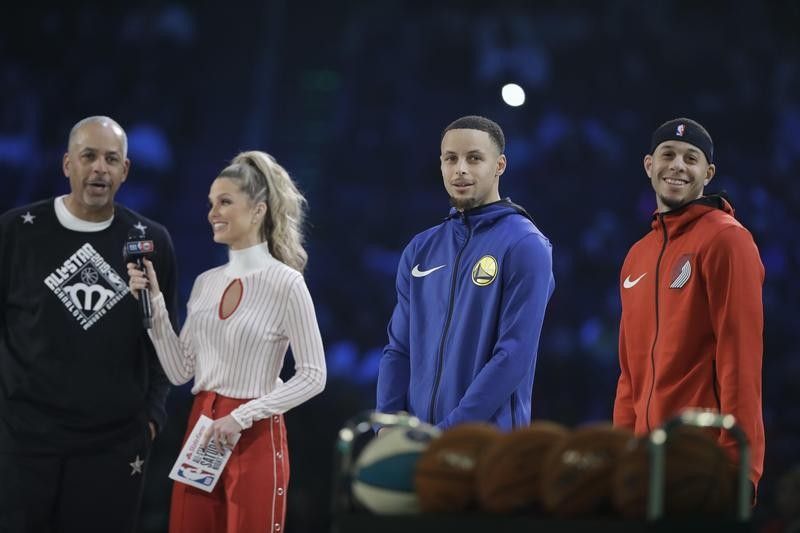 Delly Curry interviewed with his son's Steph Curry and Seth Curry at NBA All Star 3 Point contest