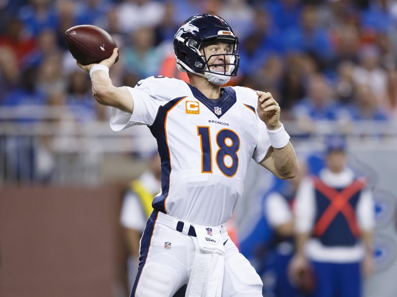Denver Broncos quarterback Peyton Manning passes against Detroit Lions