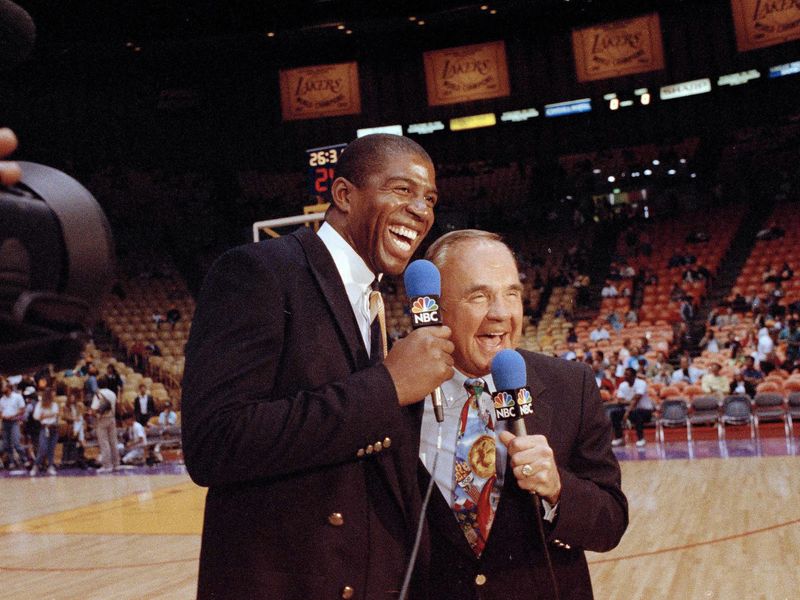 Earvin "Magic" Johnson and Dick Enberg crack up during pre-game