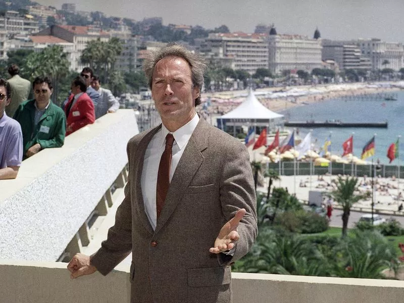 Clint Eastwood poses on the terrace of the Carlton Hotel in Cannes, France on Saturday, May 21, 1988.