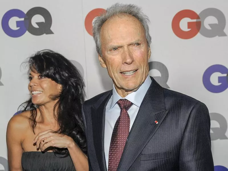 Clint Eastwood arrives with his wife Dina at the 2009 GQ "Men of the Year" party in Los Angeles.
