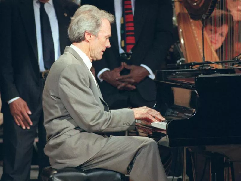 Clint Eastwood plays piano at "Eastwood: After Hours, A Night of Jazz" in 1996. The event paid tribute to Eastwood's love of jazz, as well as his use of jazz in his movies.