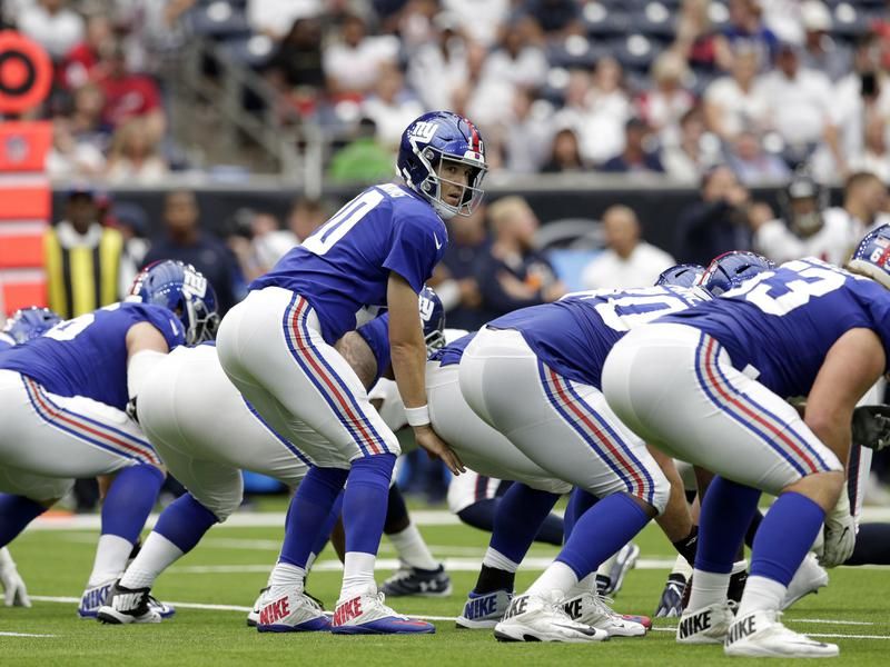 Eli Manning and Giants offensive line