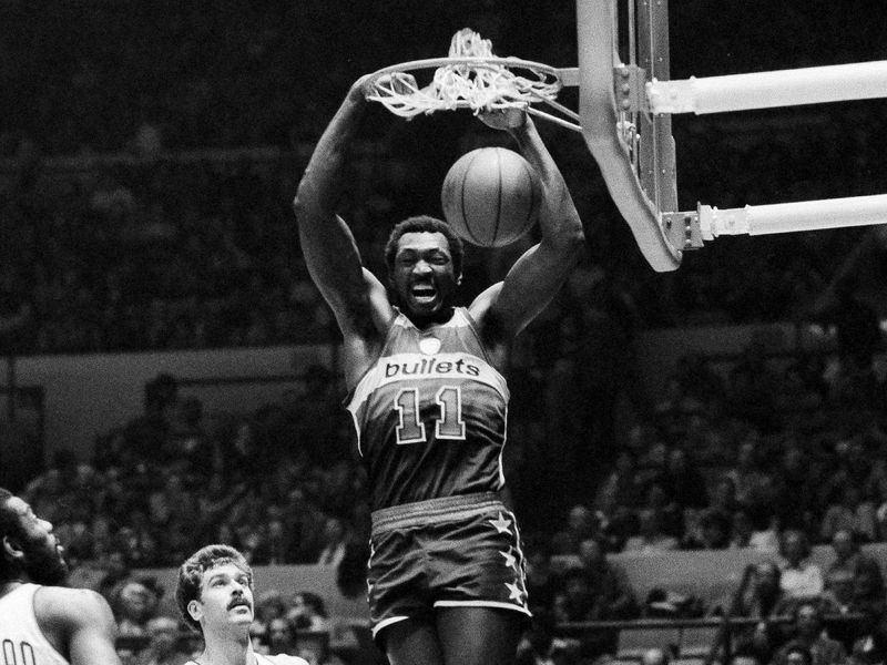Elvin Hayes dunks the ball
